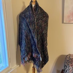 Amazing scarf wrap that has Baja poncho vibes - black and gray with neon accents
